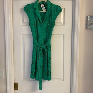 An emerald green dress